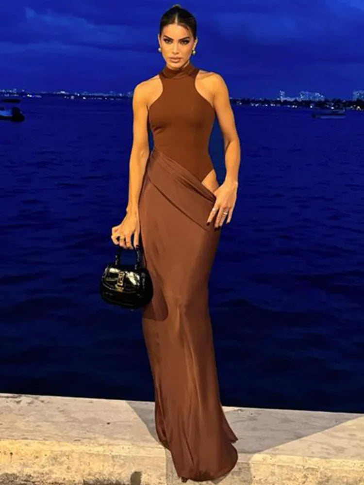 فستان أسود طويل بدون أكمام، ضيق وأنيق للحفلات.