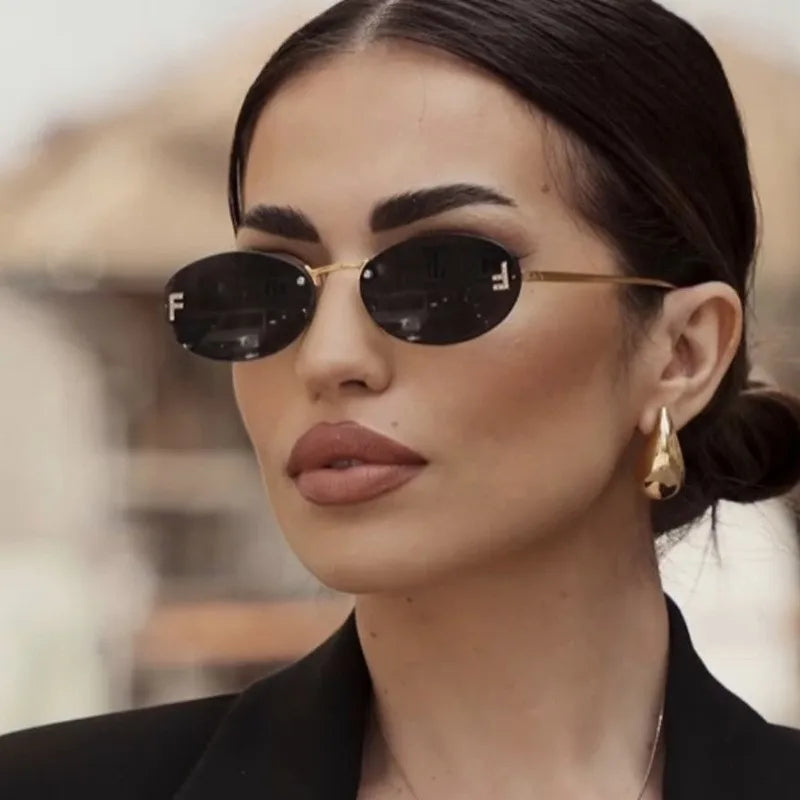 نظارات شمسية معدنية بدون إطار أنيقة وعصرية