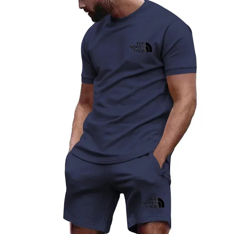 طقم رجالي رياضي كاجوال، مكون من تيشيرت بأكمام قصيرة وشورت للجري. تصميم صيفي جديد، متعدد الألوان وجيد التهوية، ومكون من قطعتين