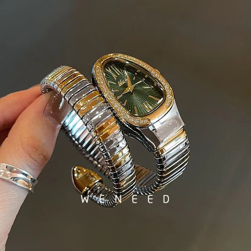 ساعة نسائية فاخرة بتصميم أفعى – سوار كريستال أنيق